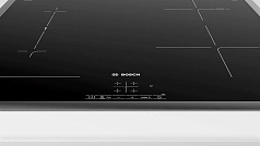 Индукционная варочная панель Bosch PWP645BB5E на 4 конфорки, шириной 58.3 см, черный в Санкт-Петербурге
