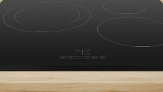 Индукционная варочная панель Bosch PUJ631BB5E на 3 конфорки, шириной 59.2 см, черный в Санкт-Петербурге